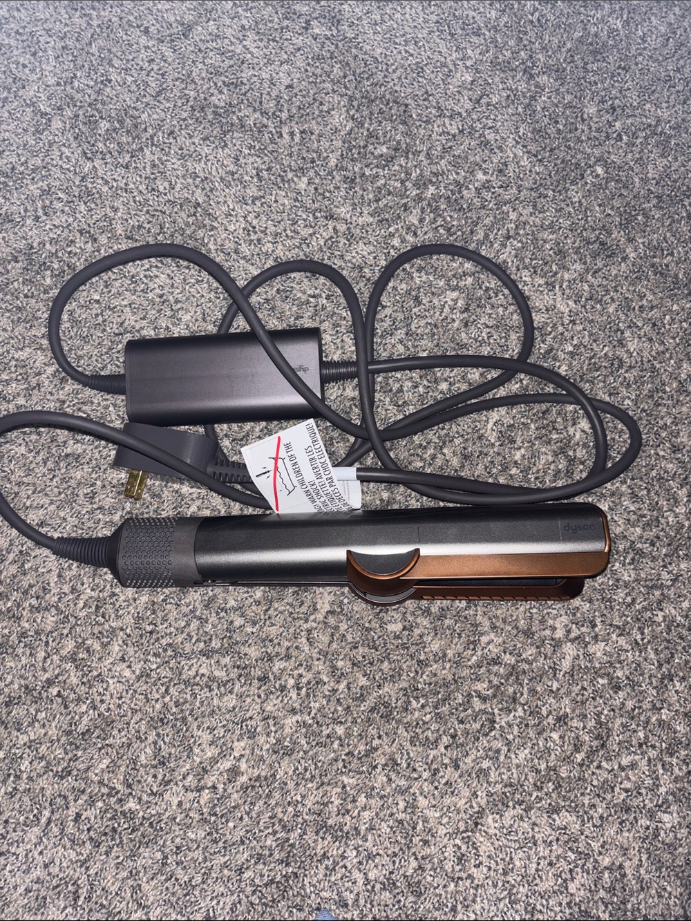 Dyson AirStraight hair straightener in black and copper accents